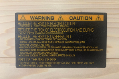 Warning and caution label on a wooden background