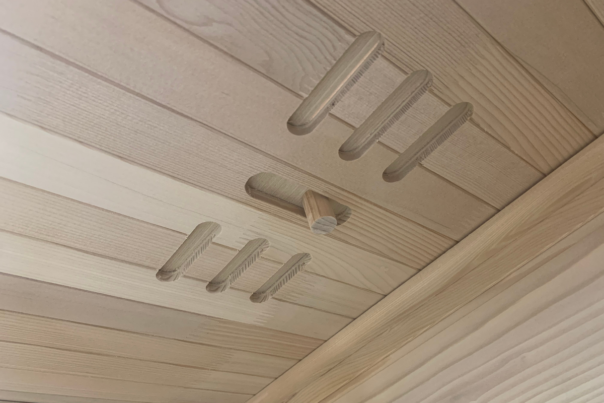 Wooden ceiling with a ladder and horizontal slats