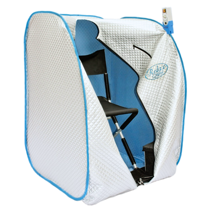 A portable mini sauna tent with a white quilted exterior, light blue trim, and a blue interior, shown with a folding chair inside. A small control valve is attached at the top right.