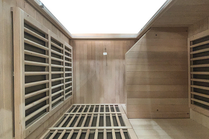 Wooden sauna interior with lattice design on walls 
