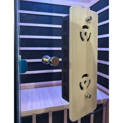 Wooden sauna control panel with electronic components on a sauna interior background