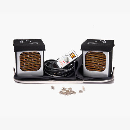 A foot bath kit featuring two black-and-silver heated foot cups with mesh fronts, a central control unit, a black cable, and several small silver ceramic heating elements on a white background.