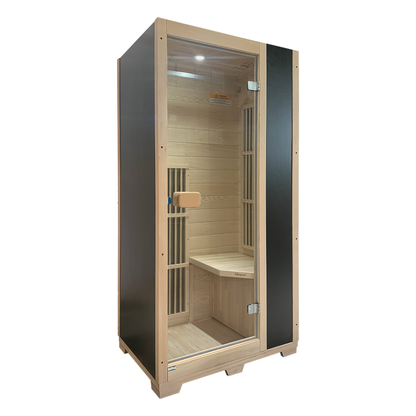 Infrared sauna with wooden interior and glass door on a white background