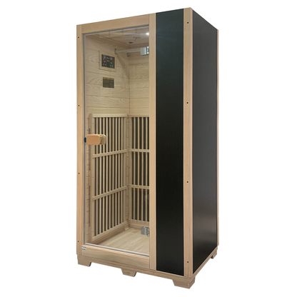Infrared sauna with wooden interior and black exterior on a white background