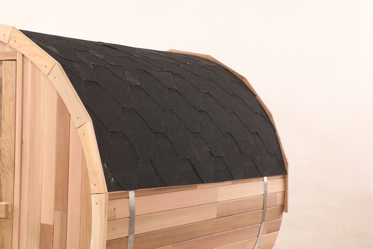 Wooden sauna with a black roof on a white background